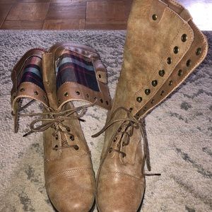 Tan ankle or mid-calf boots